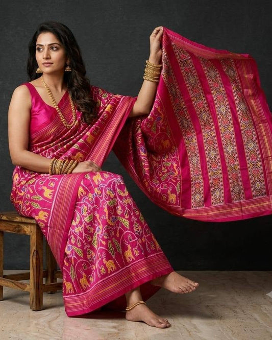 Vibrant Magenta Patola Saree with Traditional Animal Motifs and Striped Pallu
