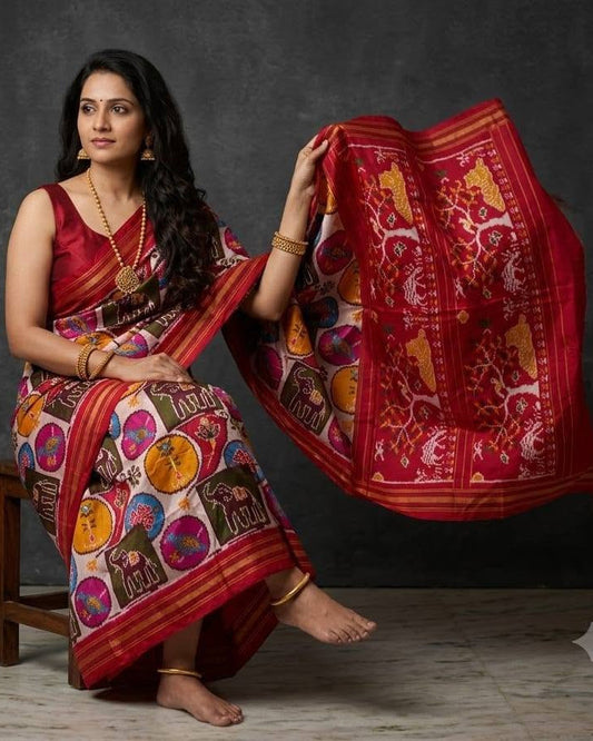 Off-White and Multi-Color Patola Saree with Traditional Elephant and Floral Motifs and Rich Red Pallu
