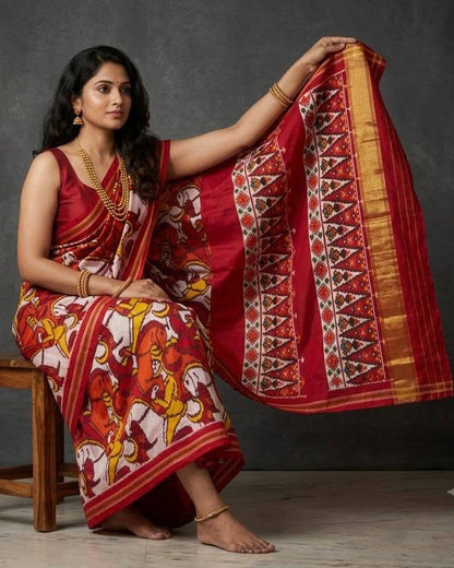 Red and White Patola Saree with Traditional Figural Motifs and Grand Gold Zari Pallu