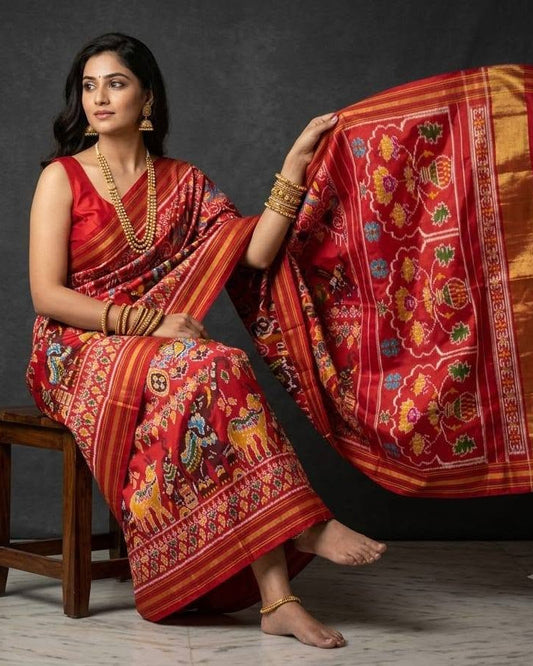 Traditional Red Patola Silk Saree with Intricate Floral Motifs