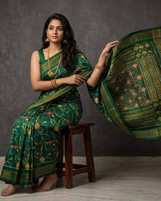 Emerald Green Patola Saree with Intricate Multi-Color Floral Motifs and Zari Pallu