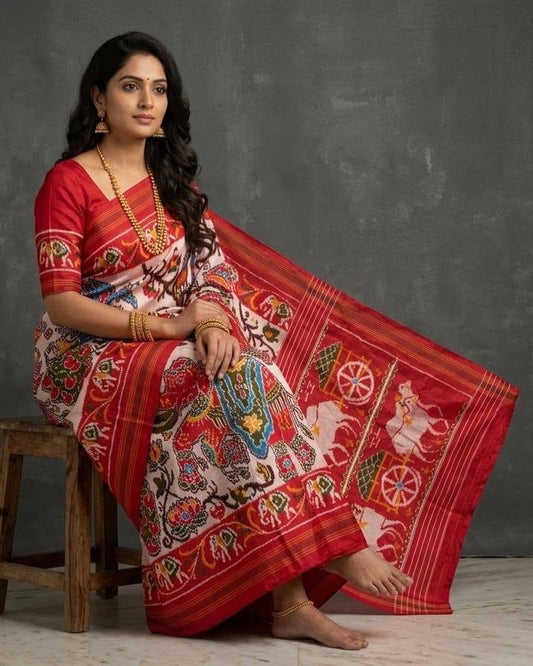 Elegant White and Red Patola Saree with Traditional Elephant & Floral Motifs