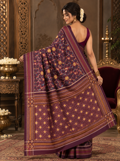 Deep Plum Patola Saree with Traditional Floral Motifs and Gold Zari Pallu