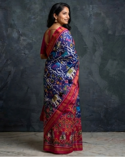 Royal Blue and Magenta Patola Saree with Traditional Animal Motifs and Zari Border