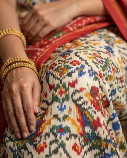 Ivory and Red Patola Saree with Traditional Chariot Motifs and Golden Zari Border