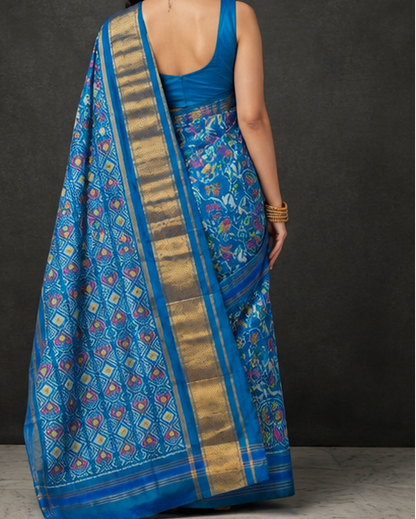 Sky Blue Patola Saree with Traditional Floral Motifs and Grid-Patterned Zari Pallu